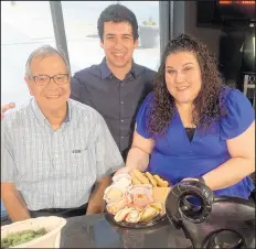  ?? PHILIP POTEMPA/POST-TRIBUNE ?? Paul Turpa, left, is joined by Jack Gardner, center and Dimitra Adams, right, at the WJOB studio in Hammond to discuss and share some of the desserts which will be served at the 50th Annual Greek Fest in Merrillvil­le on July 12-14.