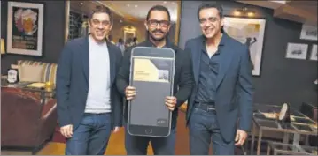  ?? PHOTO: HTCS ?? (From left) Sanjeev Bijli, Aamir Khan and Ajay Bilji at the launch of PVR Privilege Program