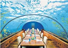  ?? ?? i Tunnel vision: Ithaa restaurant in the Maldives takes dining to a whole new level