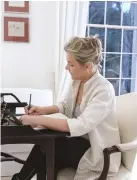  ??  ?? TOP A neoclassic­al hall table with marble top stands opposite an Austrian wooden bench. A Thai Buddha wears a headdress made by Helen’s daughter. The two hand- painted, lacquered chairs are French 19th- century ABOVE Helen at an Oka desk in her bedroom