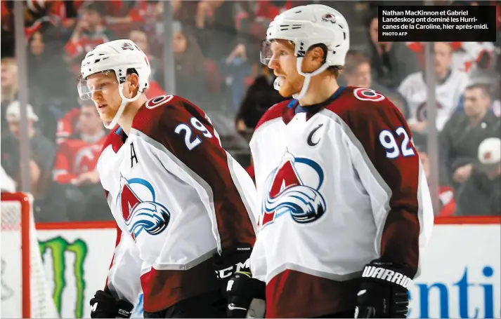  ?? PHOTO AFP ?? Nathan MacKinnon et Gabriel Landeskog ont dominé les Hurricanes de la Caroline, hier après-midi.