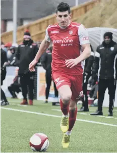  ??  ?? Two-goal hero Michael Coulson goes on the attack