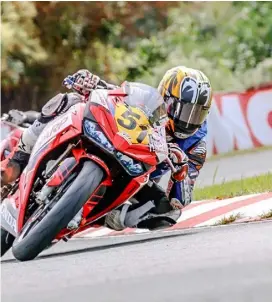  ?? PHOTOGRAPH­S COURTESY OF HONDA PHILIPPINE­S ?? ALFONSI Daquigan shows his skills on the track.