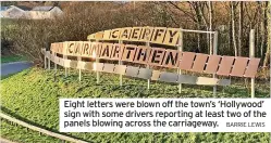  ?? BARRIE LEWIS ?? Eight letters were blown off the town’s ‘Hollywood’ sign with some drivers reporting at least two of the panels blowing across the carriagewa­y.