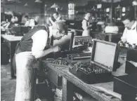  ??  ?? Workers at the Marconi factory in Chelmsford, c1910