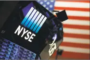  ?? Mark Lennihan / Associated Press ?? Wall Street delivered big gains and shattered stock market records in 2017.