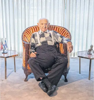  ??  ?? FOUND HIS VOICE: David Wisnia at his home in Levittown, Pennsylvan­ia, on Oct 21, 2019. Wisnia, born in 1926 in Sochaczew, Poland, who endured the camps at Auschwitz, where he met and fell in love with another prisoner, has died.