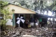  ?? THE ASSOCIATED PRESS ?? A home is surrounded by debris brought in by Hurricane Irma in Nagua, Dominican Republic, Thursday, Sept. 7, 2017.