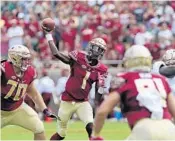  ?? STEVEN CANNON/AP ?? After getting coached up late, Florida State’s James Blackman completed nine straight passes for 127 yards and two touchdowns against Miami.