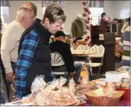  ?? JESI YOST — FOR MEDIANEWS GROUP ?? Along with savory food, Holy Trinity offered a large variety of sweets, including baked goods of all kinds. The bazaar originally began offering just Nut Roll and Poppy Seed Rolls. Over the years, the church has expanded its offerings to also include: Lekvar (prune), apricot, cherry, and raspberry rolls.