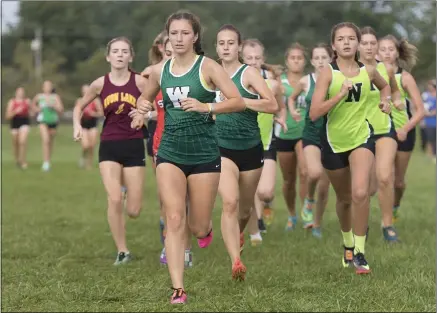  ?? JENNIFER FORBUS — FOR THE MORNING JOURNAL ?? Area runners compete in the high school girls Maroon race during the 2021Avon Lake Early Bird Invitation­al cross country meet Sept. 4.