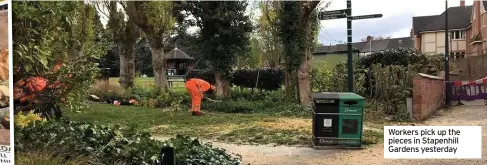  ??  ?? Workers pick up the pieces in Stapenhill Gardens yesterday