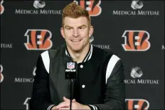  ?? GARY LANDERS — THE ASSOCIATED PRESS FILE ?? Andy Dalton answers questions after the Bengals the Browns last Decemeber in Cincinnati.
defeated