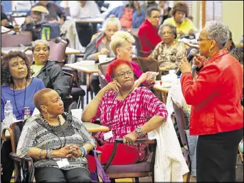  ?? CURTIS COMPTON / CCOMPTON@AJC.COM ?? Marcia Hunter, president of DeKalb for Seniors, addresses the crowd during a town hall discussing how repealing the Affordable Care Act could affect seniors Wednesday at the Lou Walker Senior Center in Lithonia.