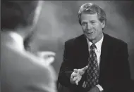  ?? RICHARD HARTOG/LOS ANGELES TIMES FILE PHOTOGRAPH ?? Peter Navarro, right, talks with anchor Ed Arnold before the taping of the “Real Orange Show” at KOCE on the Goldenwest College campus in Huntington Beach. Peter Navarro is now the director of trade and industrial policy and the head of the new...