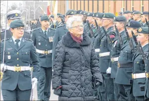  ?? MITCH MACDONALD ?? P.E.I. Lt.-Gov. Antoinette Perry inspects the guard prior to the opening of the fall session of the P.E.I. legislatur­e on Tuesday.