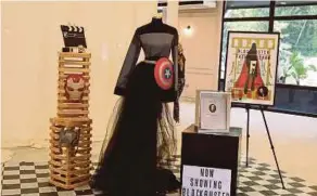  ??  ?? A dress from previous year’s collection with the theme ‘Avengers’ being displayed at the foyer.