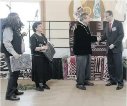  ?? NICK PROCAYLO/ PNG FILES ?? Technology, Innovation and Citizen’s Services Minister Andrew Wilkinson with, from left, Musqueam Chief Wayne Sparrow, Tsleil- Waututh Chief Maureen Thomas and Byron Joseph, co- chair of the Squamish Nations Council sign a protocol involving the...