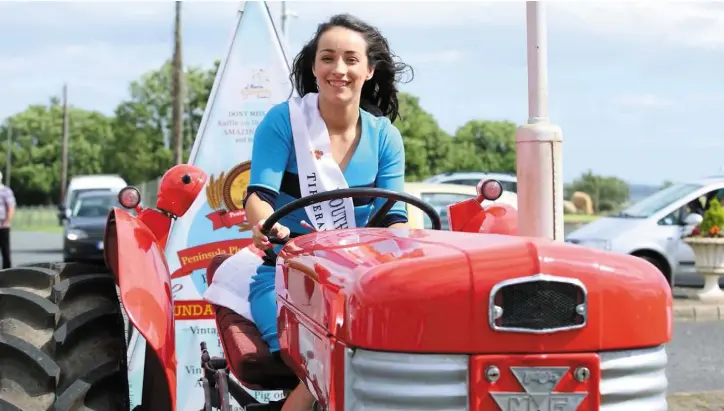  ??  ?? Louth Rose, Megan Ferguson starts off on her journey to The Rose of Tralee Festival from St Mary’s Hall, Cooley, on appropriat­ely, a Massey Ferguson.