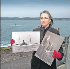  ?? Photograph: Warren Media ?? Just a short distance from the wreck site, descendant Anne Frater holds a picture of her great-grandfathe­r John Macleod who was lost in the ship wreck.