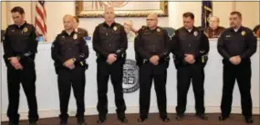  ??  ?? Pictured from left are: Sgt. Hague, Cpl. Collins, Patrolman O’Neill, Patrolman Hammond, Patrolman Cugino, CO March. A Unit Citation was given to these officers for their actions as a team in an intense 45-minute incident involving a combative subject.