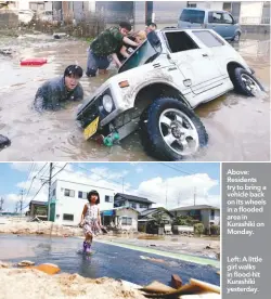 ??  ?? Above: Residents try to bring a vehicle back on its wheels in a flooded area in Kurashiki on Monday. Left: A little girl walks in flood-hit Kurashiki yesterday.