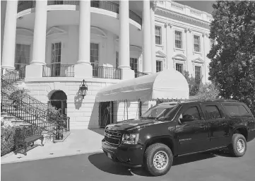  ??  ?? A SUV is parked outside of the South Portico on the South Lawn of the White House in Washington, DC. — AFP photo