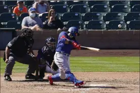  ?? ASHLEY LANDIS — ASSOCIATED PRESS FILE ?? Texas Rangers’ Rougned Odor hits a home run during an exhibition game against the Colorado Rockies on Monday, March 22, in Scottsdale, Ariz.