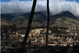  ?? ?? Fire damage in Lahaina, Hawaii, on 13 August 2023. Photograph: The Washington Post/ Getty Images