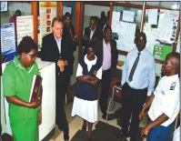  ??  ?? Celebratio­n Church founder, Pastor Tom Deuschle (second from left) exchanges notes with Mutare City Health Department employees recently