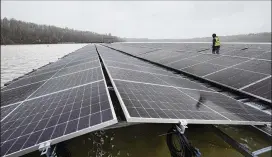  ?? AP ?? Solar panels are installed at a plant on a lake in Germany. It’s not a summer heat wave that’s making European leaders and businesses sweat. It’s fear that Russia’s manipulati­on of natural gas supplies will lead to an economic and political crisis.