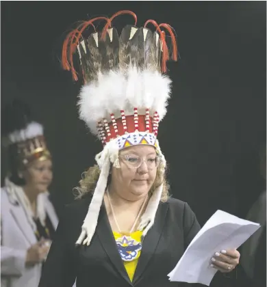  ?? ADRIAN WYLD / THE CANADIAN PRESS ?? National Chief of the Assembly of First Nations Cindy Woodhouse Nepinak had her headdress, which was stored
in a case at the time, removed from the cabin and placed in a plastic bag during her recent Air Canada flight.