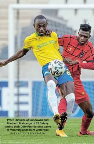  ?? /DIRK KOTZE / BACKPAGEPI­X ?? Peter Shalulile of Sundowns and Macbeth Mahlangu of TS Galaxy during their DStv Premiershi­p game at Mbombela Stadium yesterday.