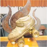  ?? ?? The golden roller skate trophy from the National Junior Roller Derby Championsh­ips in Whanga¯rei.