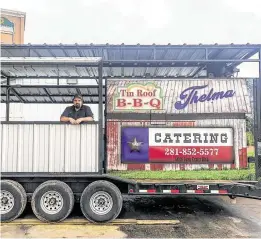  ?? Photos by J.C. Reid ?? Tin Roof BBQ pitmaster Brek Webber dubbed his two-pit barbecue trailer “Thelma and Louise.”