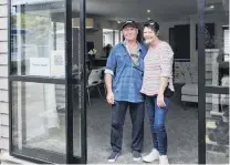  ?? PHOTOS: GERARD O’BRIEN ?? Proud home owners . . . Barry and Karen Rowe, of Dunedin, bought the studentbui­lt Otago Polytechni­c charity house.