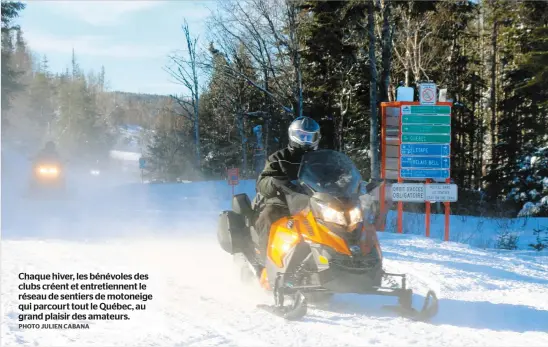  ?? PHOTO JULIEN CABANA ?? Chaque hiver, les bénévoles des clubs créent et entretienn­ent le réseau de sentiers de motoneige qui parcourt tout le Québec, au grand plaisir des amateurs.