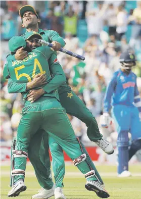  ?? Picture: AFP ?? PARTY TIME. Pakistan players celebrate their victory over India in the ICC Champions Trophy final at The Oval in London yesterday. Pakistan thrashed defending champions India by 180 runs to win their first global 50-overs title since the 1992 World Cup.