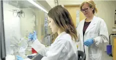  ?? SUPPLIED PHOTO ?? Brock University graduate student Jessy Moore, left, is shown in a cancer research lab with associate professor Evangelina Tsiani.