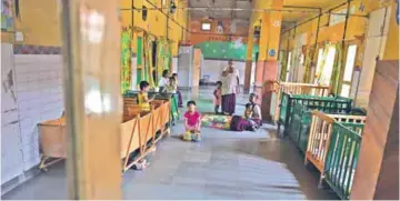  ??  ?? Indian children play at Palna - one of Delhi’s oldest adoption agencies and orphanages caring for some 70 children and registered with the government.