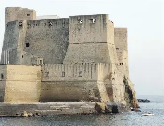  ??  ?? Legend has it that the Castel Dell'Ovo was built on top of an egg placed by the poet Virgil, who said the city would never fall as long as the egg was preserved.