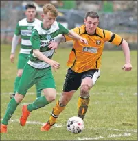  ??  ?? Fort defender Farquhar MacRae is chased by Buckie’s Mitchell Foy.