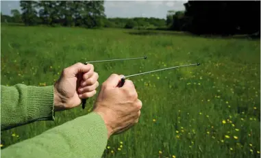  ??  ?? ABOVE: According to UK water companies, many employees continue to use divining rods to locate leaking pipes.