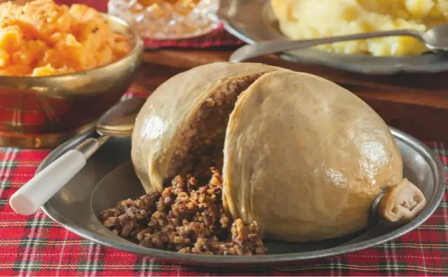  ??  ?? Above: haggis with neeps and tatties. Left: Scots annually celebrate the life of their famous bard, Robert Burns, with recitation­s of his poetry