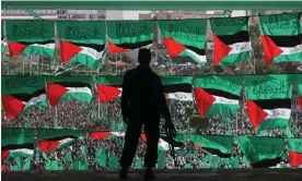  ?? Mahmud Hams/AFP/Getty Images ?? A rally marking the 21st anniversar­y of Hamas’s creation in Gaza City in 2008. Photograph: