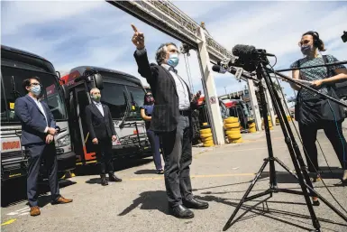  ?? Photos by Stephen Lam / Special to The Chronicle ?? S.F. Supervisor Aaron Peskin speaks at a news conference announcing an agreement to eliminate Muni fare increases for the upcoming twoyear budget cycle in response to the COVID19 pandemic.