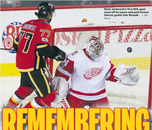  ?? WELLS — JIM ?? Mark Jankowski’s first NHL goal went off his pants and past former Detroit goalie Petr Mrazek.