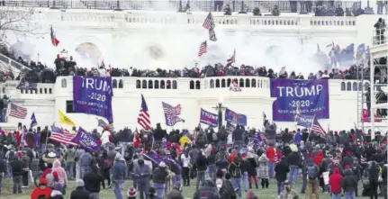  ?? (Photo: AP) ?? WASHINGTON, DC, United States — Violent protesters, loyal to President Donald Trump, storm the Capitol on Wednesday, January 6, 2021, in an attempt to overturn America’s presidenti­al election, undercut the nation’s democracy and keep Democrat Joe Biden from replacing Trump in the White House.