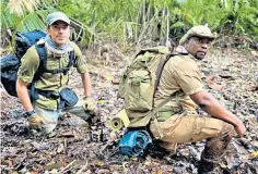  ?? ?? Muddy waters: Simon Reeve in the Congo with local guide Adams Cassinga