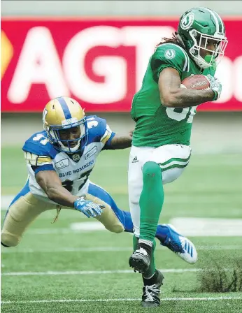  ?? TROY FLEECE ?? Naaman Roosevelt rambles with the ball after making a grab on Sunday against the Bombers. Roosevelt was Saskatchew­an’s leading receiver, with seven catches for 86 yards.